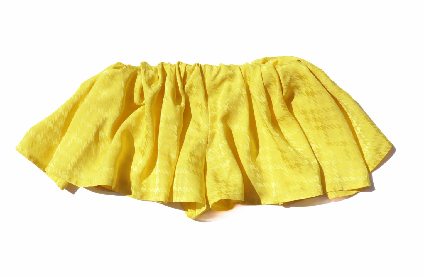 Yellow skirt on a white background